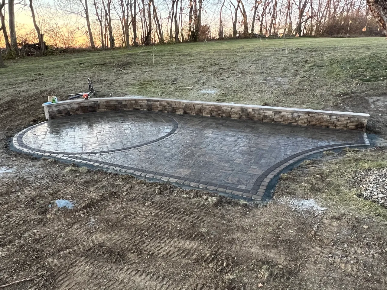 A concrete slab that has been laid in the ground.