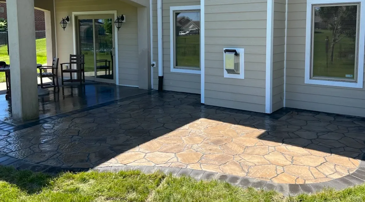 A patio with a door and window in it