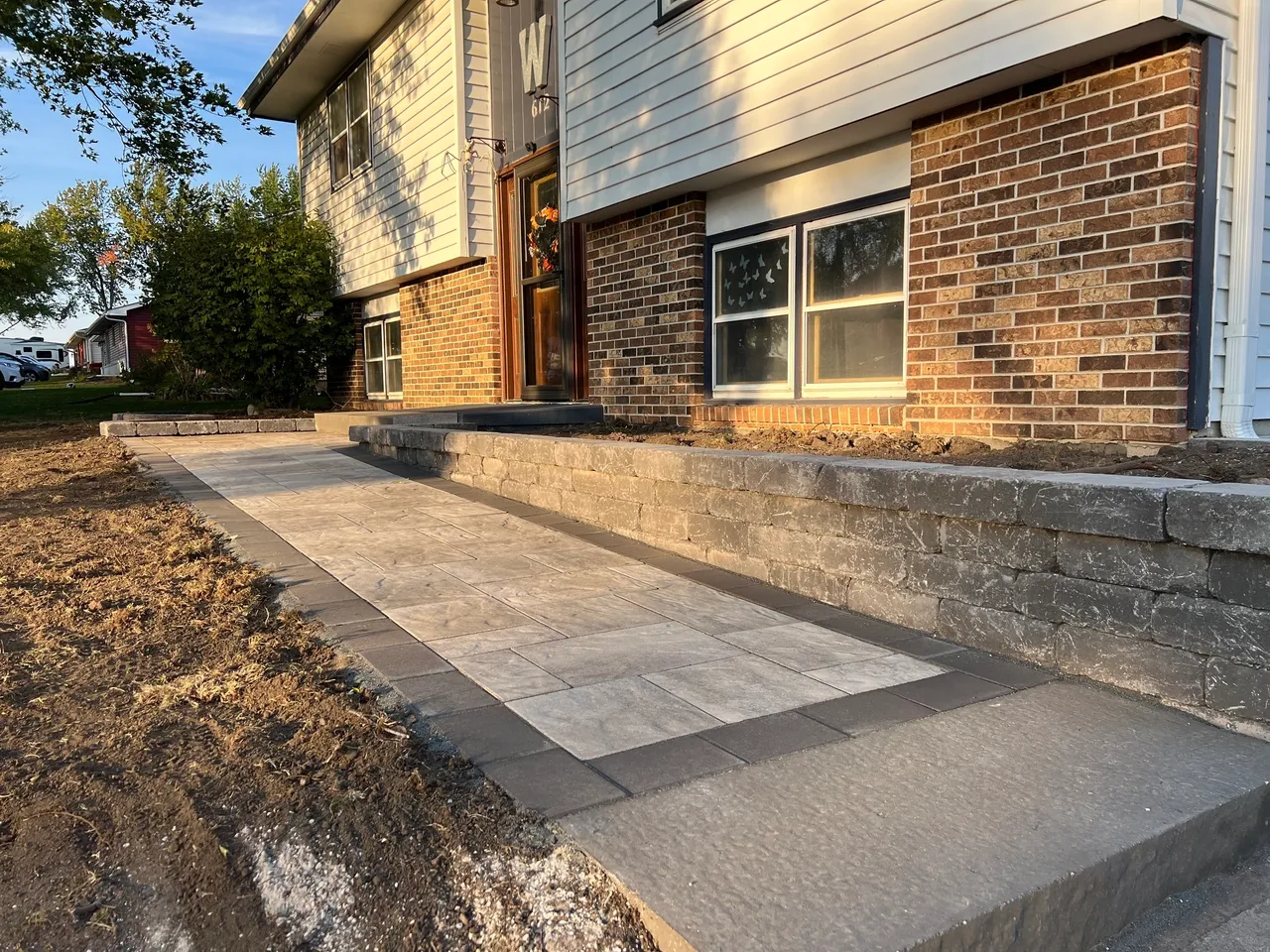 A walkway with steps leading to the house.